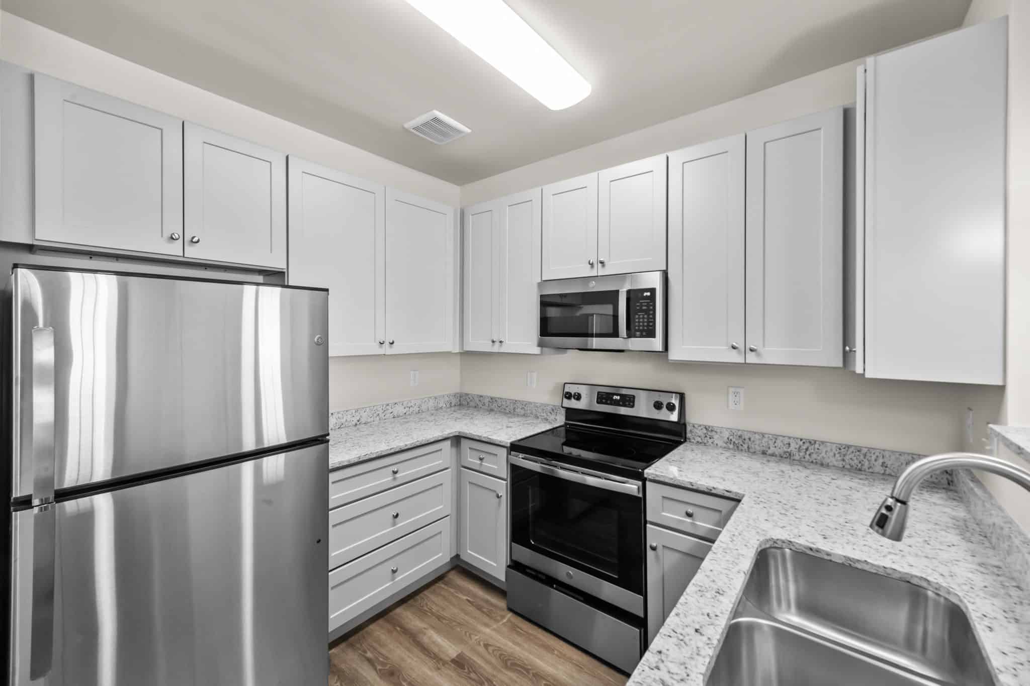 a stainless steel refrigerator in a kitchen