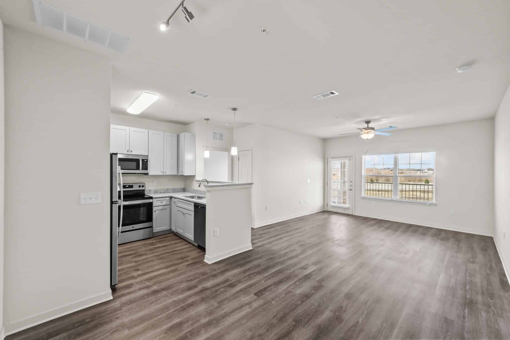 a kitchen with a wood floor